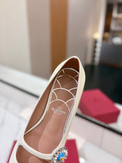 VALENTINO 26S MARY JANE FLATS IN WHITE CALFSKIN WITH CRYSTAL FLOWER