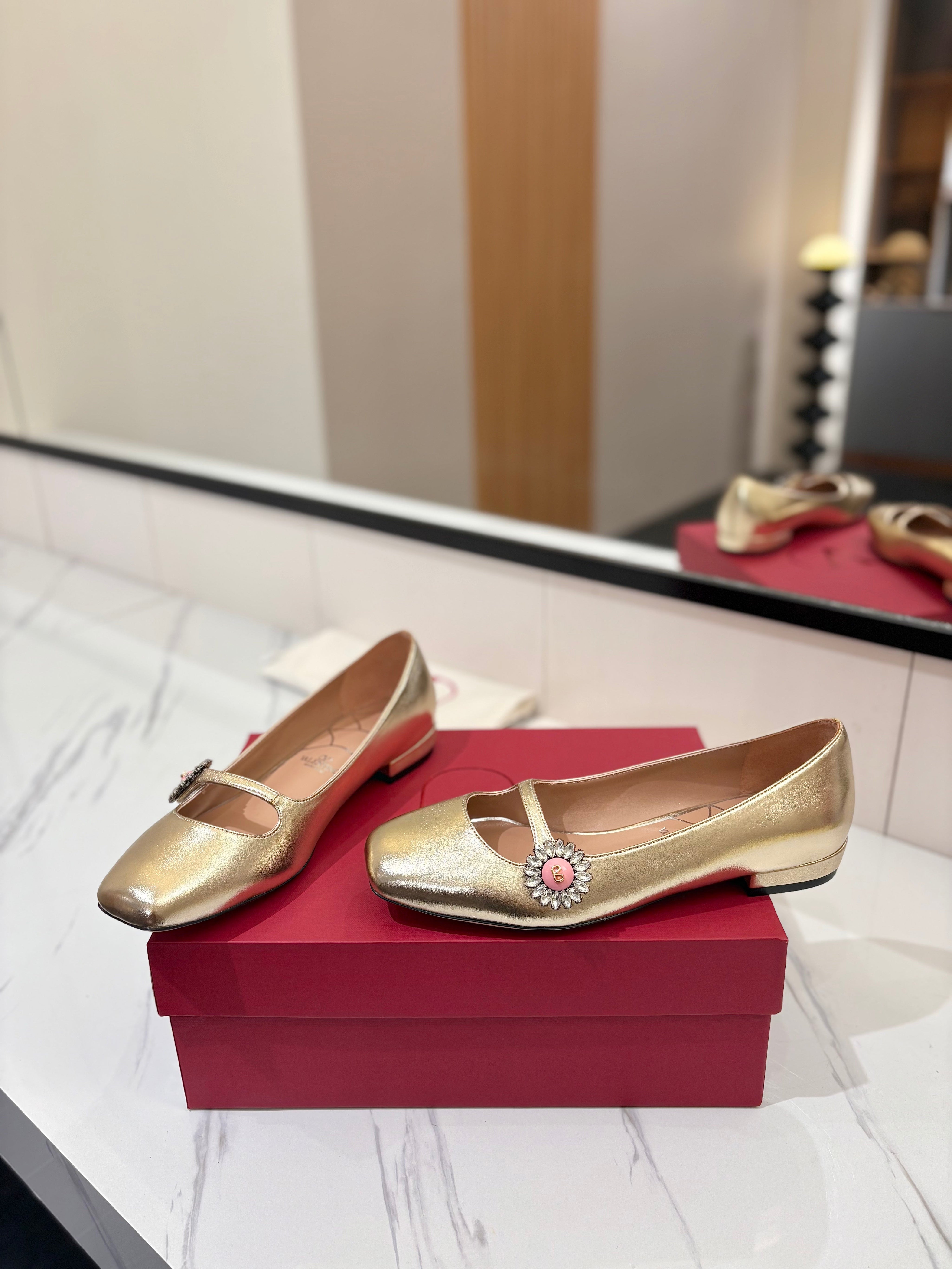 VALENTINO 26S MARY JANE FLATS IN METALLIC GOLD CALFSKIN WITH CRYSTAL FLOWER