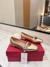 VALENTINO 26S MARY JANE FLATS IN METALLIC GOLD CALFSKIN WITH CRYSTAL FLOWER