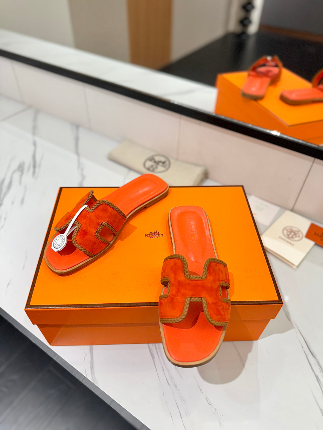 HM 26S ORAN SANDALS IN ORANGE SUEDE WITH TAN BOWN BRAIDED TRIM