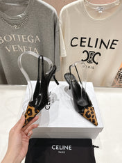 JUDY CAP TOE SLINGBACK 65MM IN BLACK PATENT CALFSKIN AND LEOPARD PRINTED HAIRY CALFSKIN