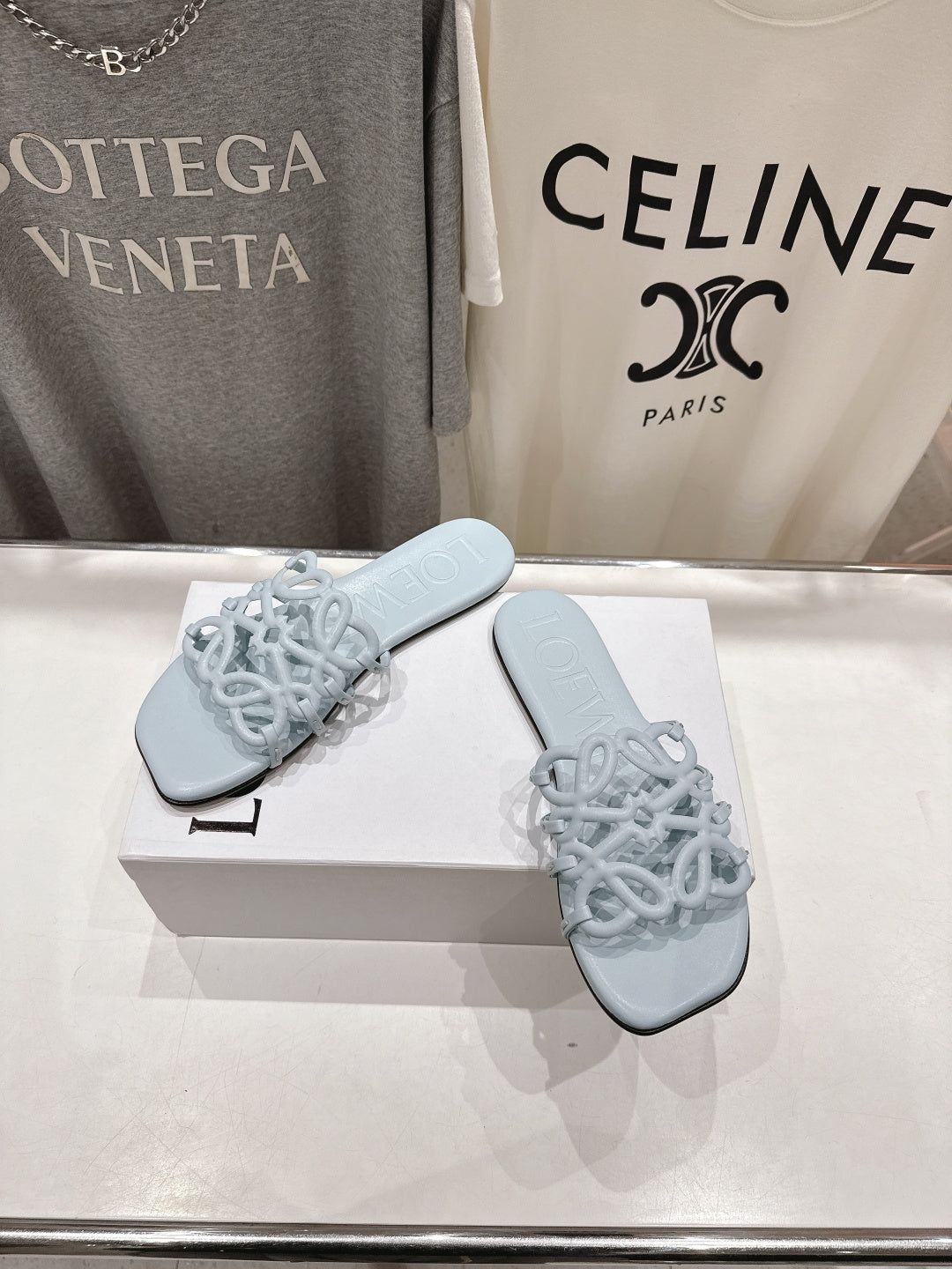 LOEWE 26S PETAL ANAGRAM SLIDE IN LIGHT BLUE CALFSKIN