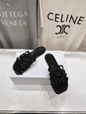 LOEWE 26S PETAL ANAGRAM SLIDE IN BLACK PATENT CALFSKIN