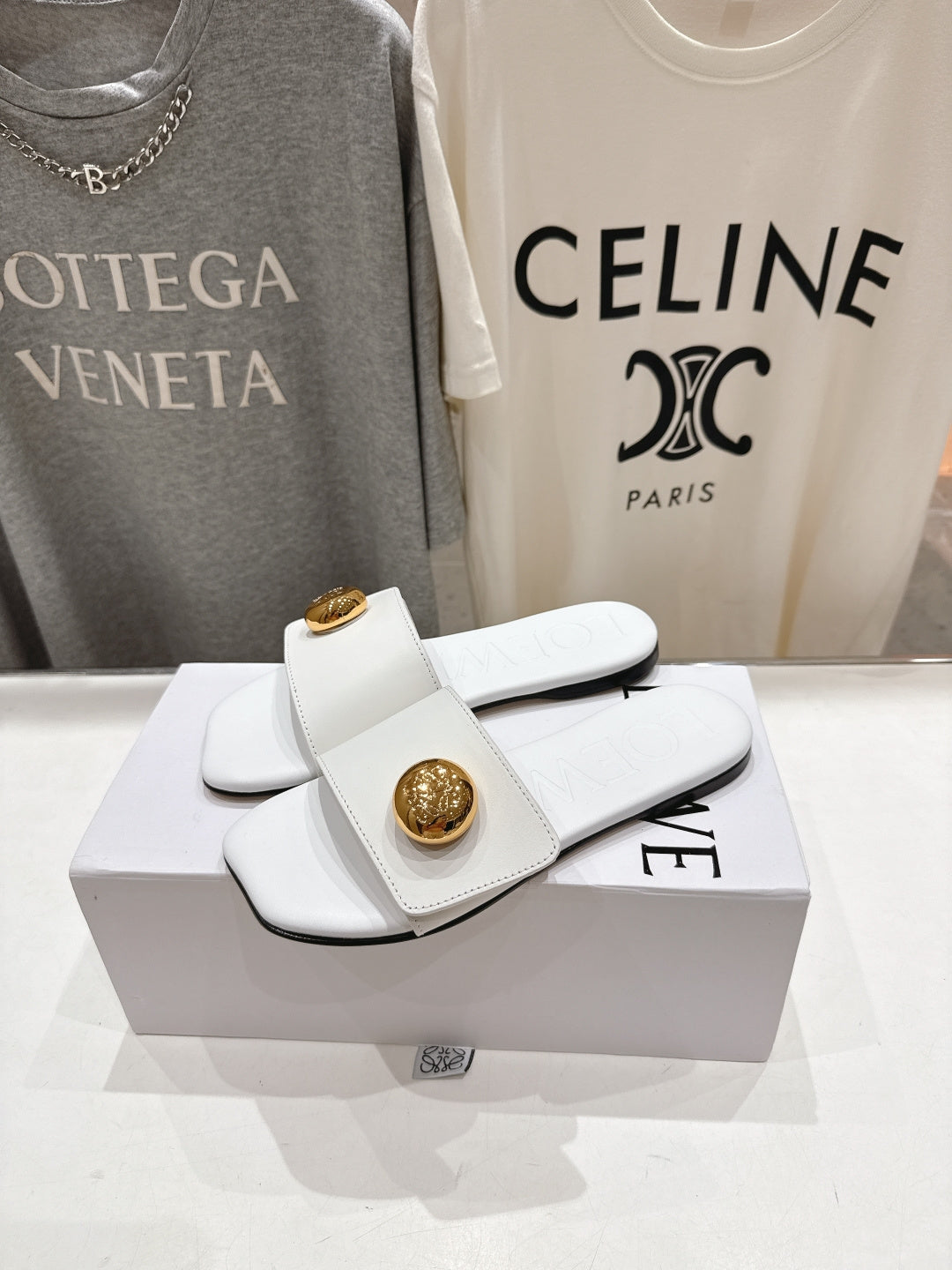 LOEWE 26S PEBBLE SLIDE IN WHITE CALFSKIN GOLD HARDWARE