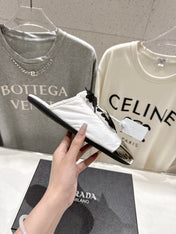 PRADA 25S MULES IN WHITE WITH METAL TOECAP