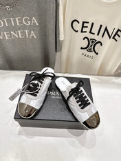 PRADA 25S MULES IN WHITE WITH METAL TOECAP