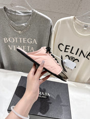 PRADA 25S MULES IN LIGHT PINK WITH METAL TOECAP
