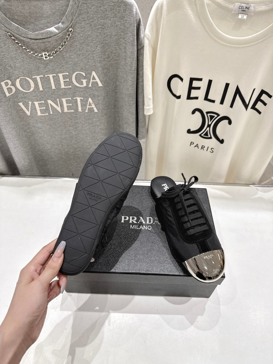 PRADA 25S MULES IN BLACK WITH METAL TOECAP