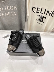 PRADA 25S MULES IN BLACK WITH METAL TOECAP