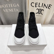 CELINE 26S BOOTS IN WHITE AND BLACK CANVAS