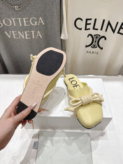 LOEWE 26S MULE LOAFERS IN BUTTER YELLOW CALFSKIN KNOT DETAIL