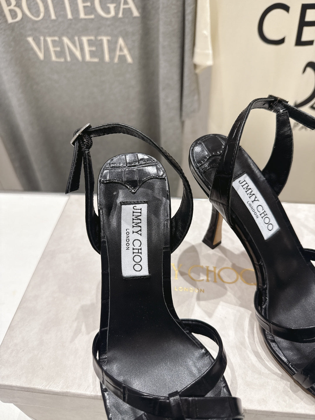 JIMMY CHOO 26S HIGH-HEELED SANDALS 100 MM IN BLACK CROC-EMBOSSED LAMBSKIN