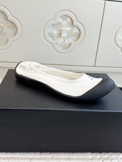 CHANEL 26S BALLET FLATS IN WHITE SUEDE AND BLACK LAMBSKIN
