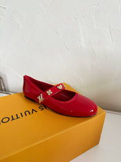ROMY FLAT BALLERINA IN RUBY RED PATENT CALFSKIN