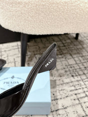 PRADA 25S POINTED-TOE MULES IN BLACK CALFSKIN
