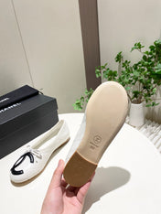 CHANEL 26S FLATS IN WHITE LAMBSKIN WITH BOW