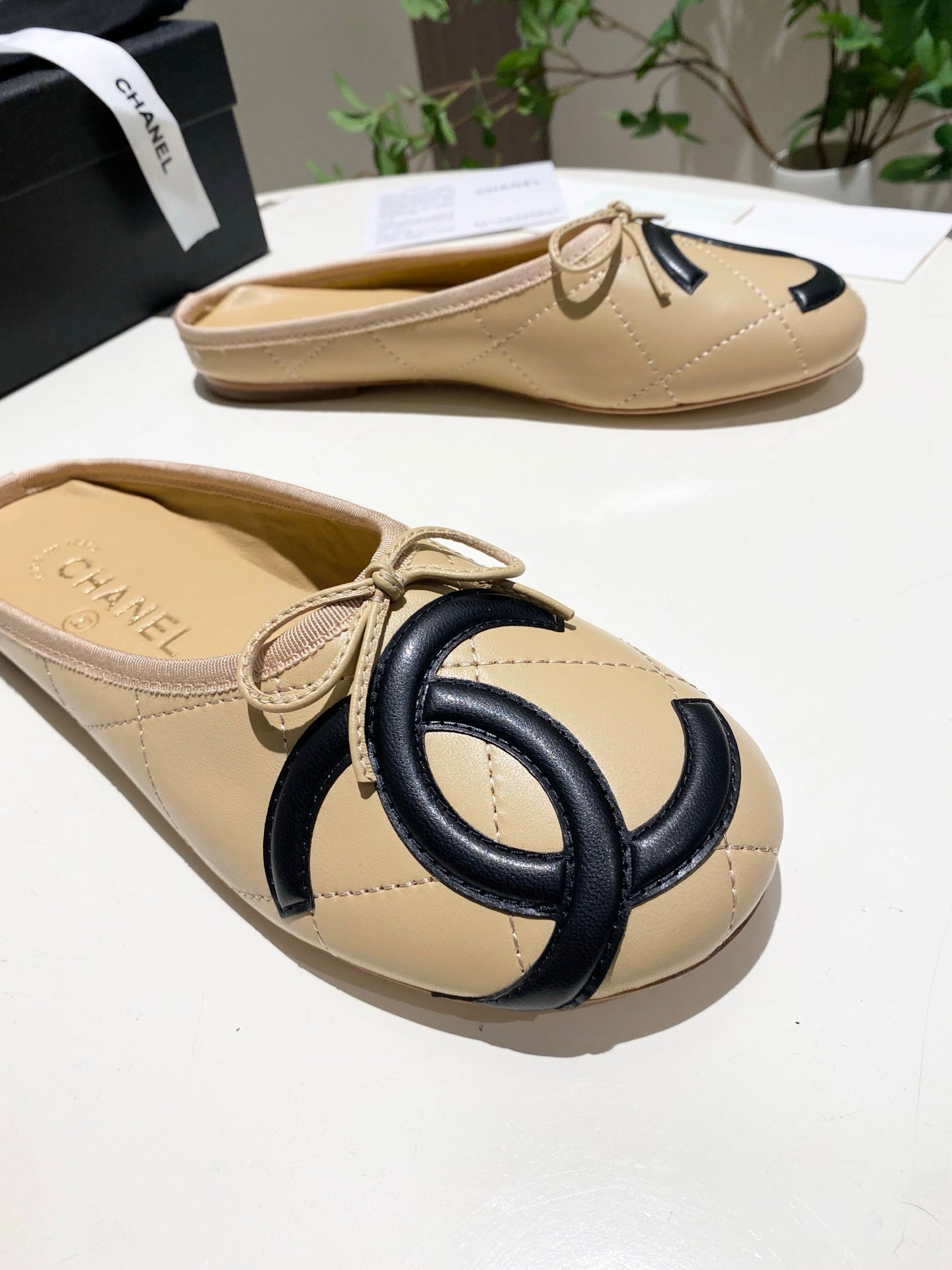 CHANEL 26S FLAT MULES IN BEIGE LAMBSKIN