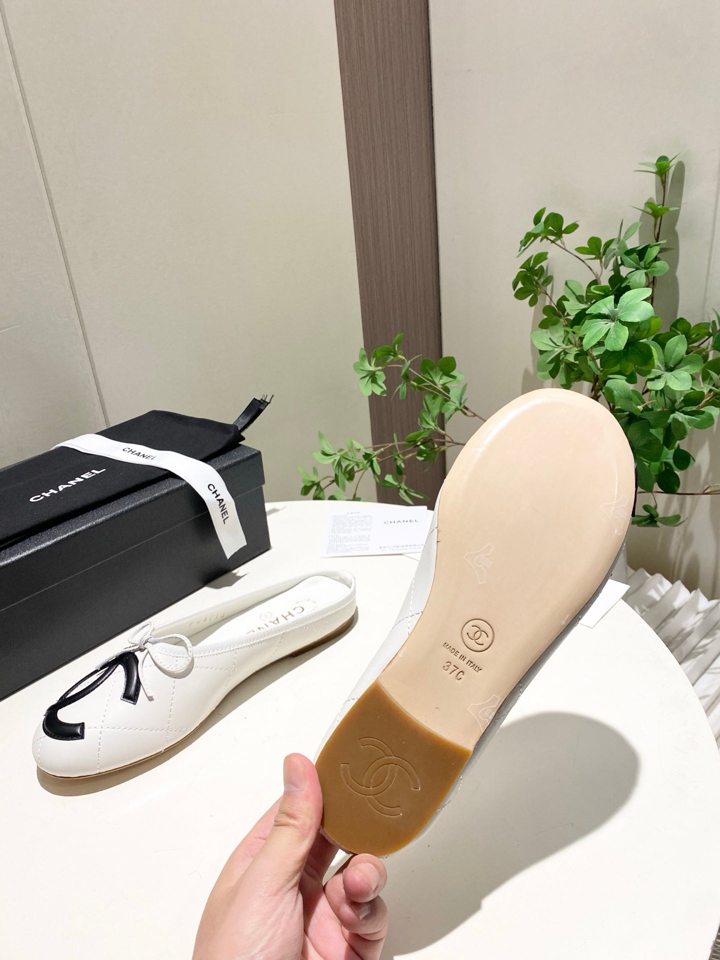 CHANEL 26S FLAT MULES IN WHITE LAMBSKIN
