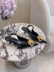 BALENCIAGA 25S HIGH SLINGBACK 35 MM IN BLACK LAMBSKIN WITH GOLD HARDWARE
