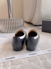CHANEL 25S TWO TONE LACE UP IN BLACK AND WHITE CALFSKIN