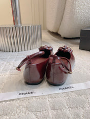 CHANEL 25S CAMELLIA SQUARE TOE FLATS IN ROSSO ANCORA CALFSKIN GOLD HARDWARE