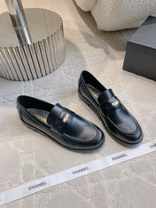 CHANEL 25S MOCCASINS IN BLACK SHINY CALFSKIN GOLD HARDWARE