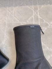 MIUMIU 26S HIGH-HEELED ANKLE BOOTS 70MM IN BLACK CALFSKIN