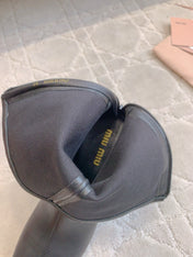 MIUMIU 26S HIGH-HEELED ANKLE BOOTS 70MM IN BLACK CALFSKIN
