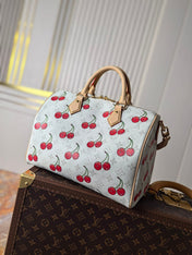 LV 25S SPEEDY SOFT 30 IN WHITE CANVAS MONOGRAM CHERRY PRINT GOLD HARDWARE