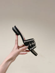 TRUMPET METALLIC MULES IN BLACK PATENT CALFSKIN WITH EMBELLISHED BUCKLE
