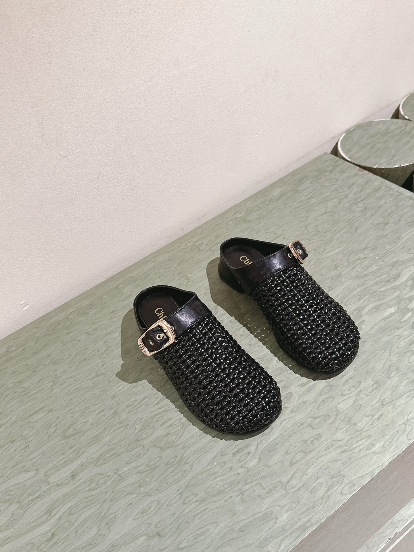 CHLOÉ 26S WOVEN MULES IN BLACK CALFSKIN