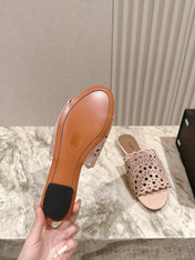 ALAIA PERFORATED SLIDE SANDALS 25S IN PINK BEIGE SUEDE
