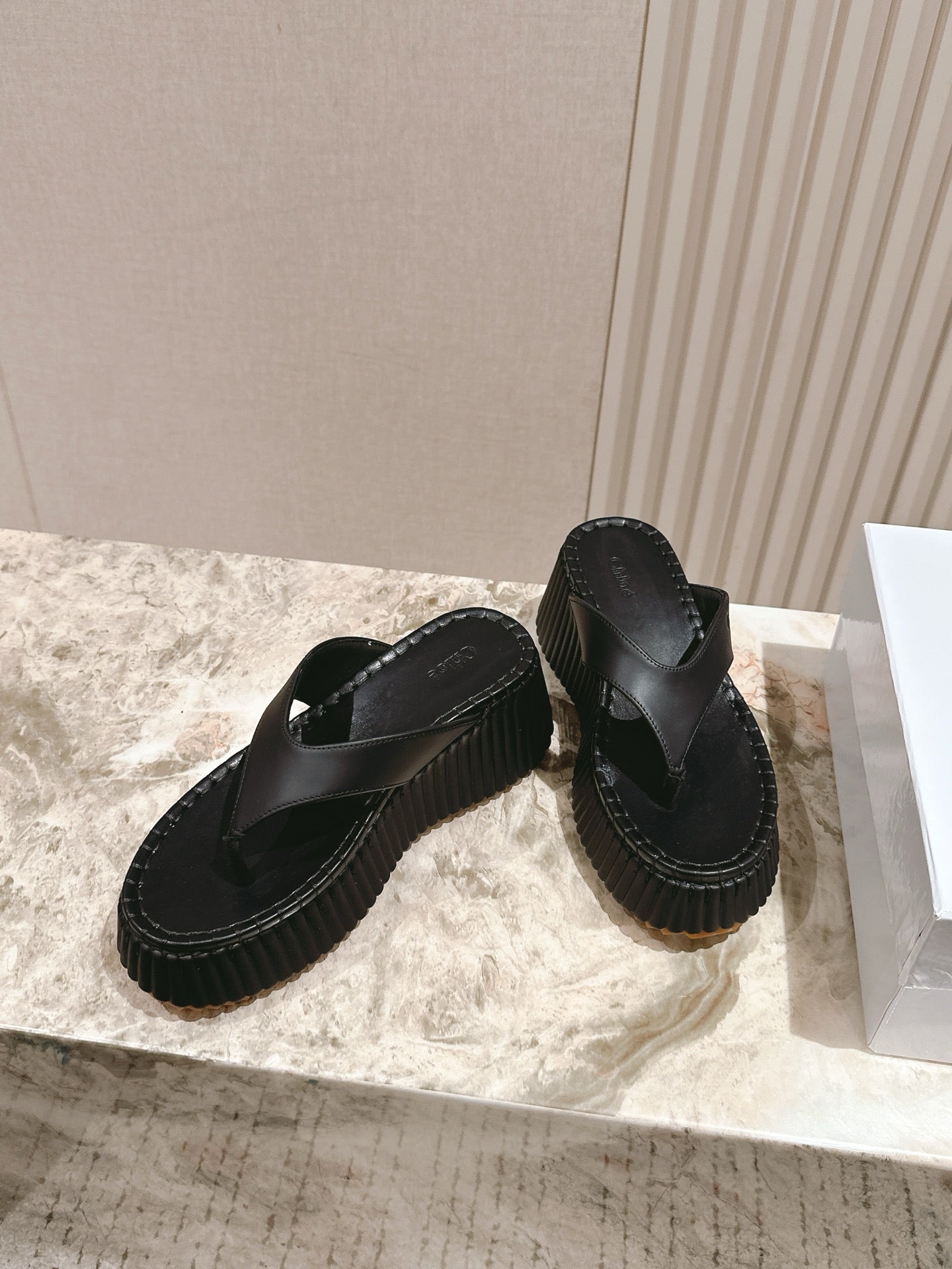 CHLOÉ 26S PLATFORM FLIP-FLOPS IN BLACK LAMBSKIN