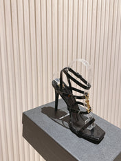 YSL 25S STILETTO HIGH-HEEL SANDALS 100 MM IN BLACK LAMBSKIN WITH GOLD HARDWARE