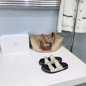 THE ROW 26S DOUBLE STRAP SLIDE SANDALS IN WHITE POLKA DOT CALF HAIR CALFSKIN