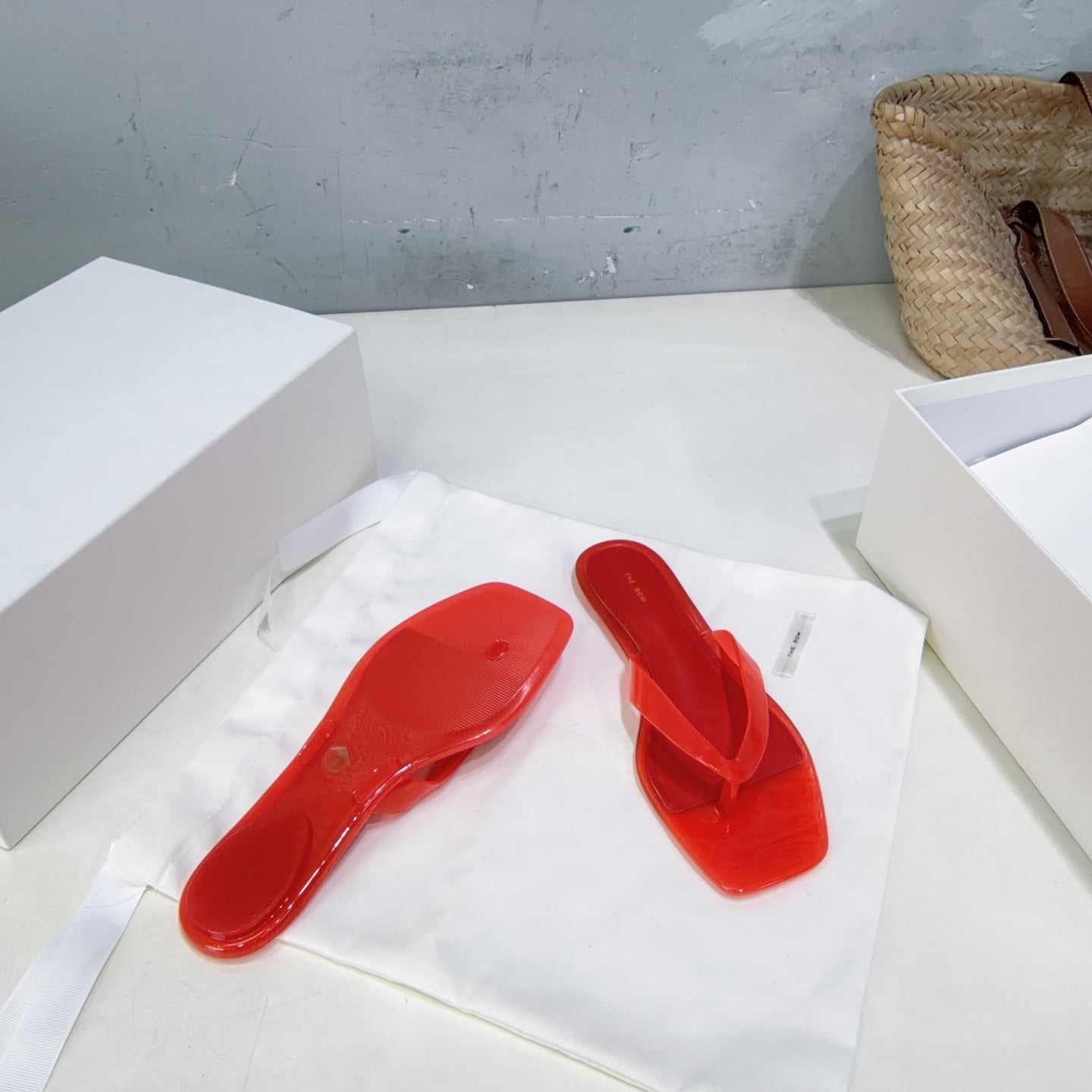 THE ROW 26S SQUARE TOE THONG SANDALS IN TRANSLUCENT RED PVC WITH SILVER FOOTBED