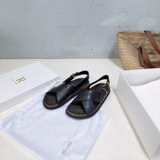 THE ROW 26S CROSS STRAP SANDALS IN BLACK CALFSKIN