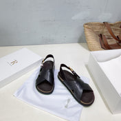 THE ROW 26S CROSS STRAP SANDALS IN BLACK CALFSKIN
