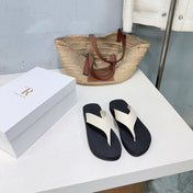 THE ROW 26S THONG SANDALS IN BLACK RUBBER  WITH WHITE STRAPS CALFSKIN