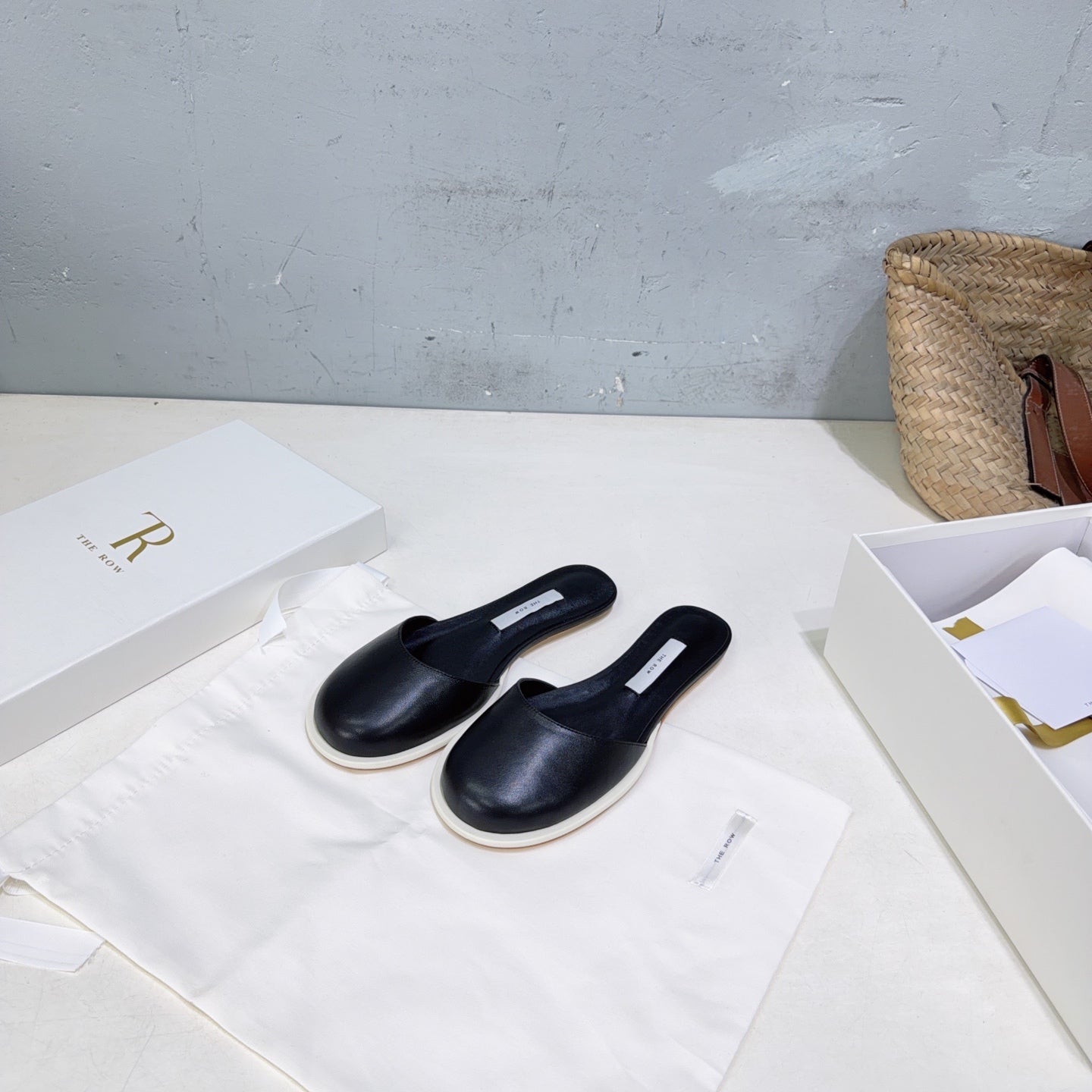 THE ROW 26S ROUND TOE MULE FLATS IN BLACK SMOOTH CALFSKIN