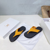 THE ROW 26S THONG SANDALS IN BLACK RUBBER  WITH GOLD YELLOW STRAPS