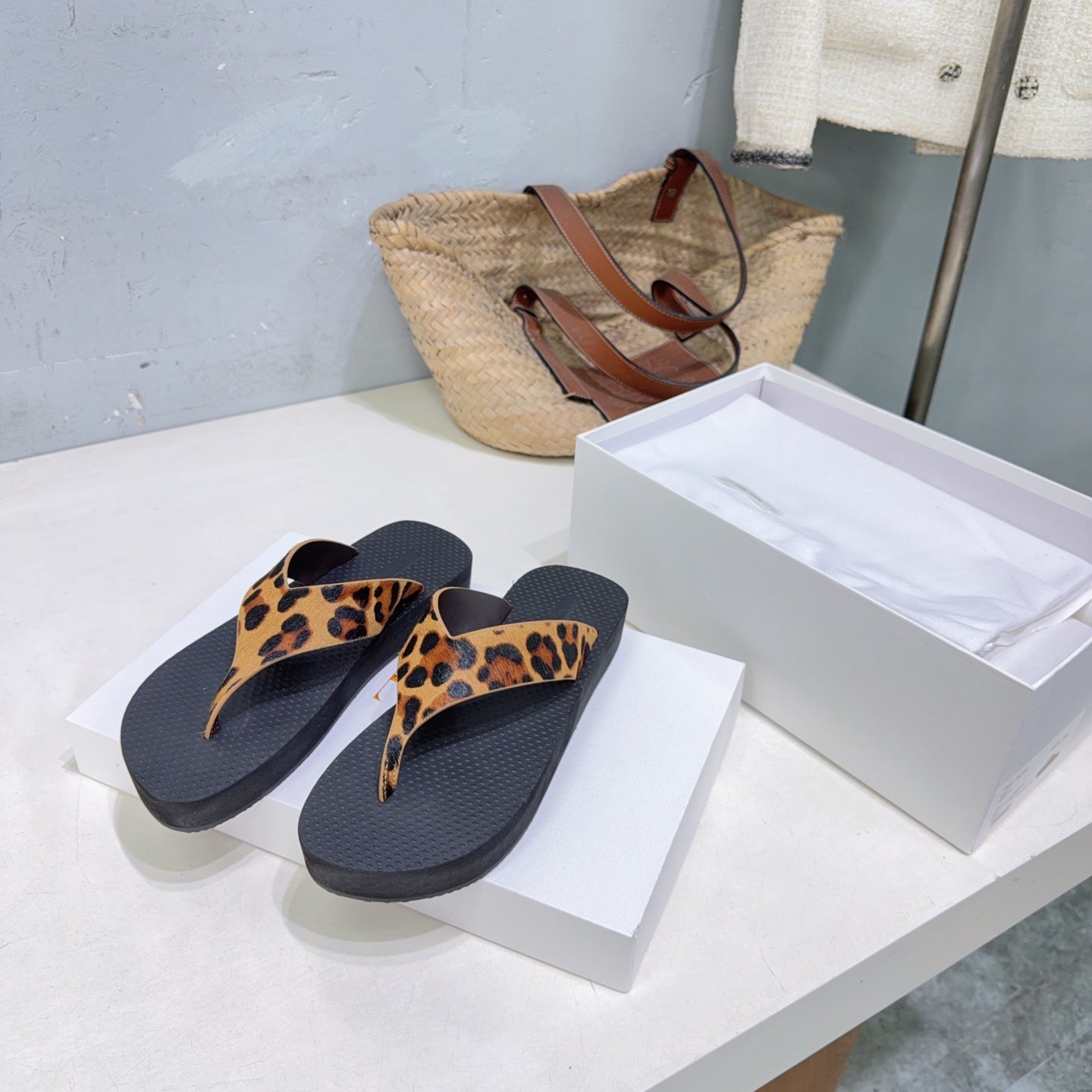 THE ROW 26S THONG SANDALS IN BLACK RUBBER WITH LEOPARD CALF HAIR STRAPS