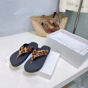 THE ROW 26S THONG SANDALS IN BLACK RUBBER WITH LEOPARD CALF HAIR STRAPS