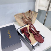ALAIA 26S HIGH-HEEL MARY JANES 50 MM IN DARK RED WOVEN MESH
