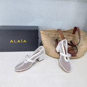 ALAIA 26S HIGH-HEEL MARY JANES 50 MM IN WHITE WOVEN MESH