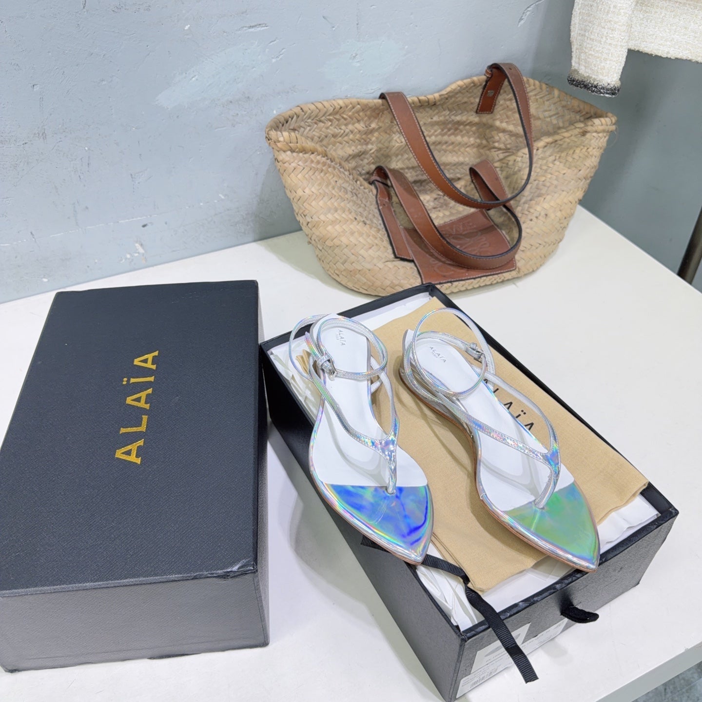 ALAIA 26S THONG SANDALS IN SILVER METALLIC CALFSKIN