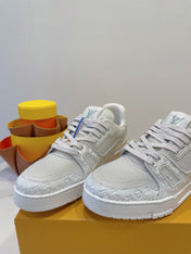 LV TRAINER MAXI SNEAKER IN WHITE EMBOSSED CALFSKIN
