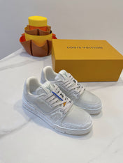 LV TRAINER MAXI SNEAKER IN WHITE EMBOSSED CALFSKIN