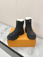 MARTIN ANKLE BOOTS IN BLACK SUEDE AND WHITE SHEARLING LINING