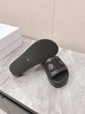 THICK-SOLED SLIDES IN BLACK SMOOTH LAMBSKIN LOGO WITH CRYSTALS